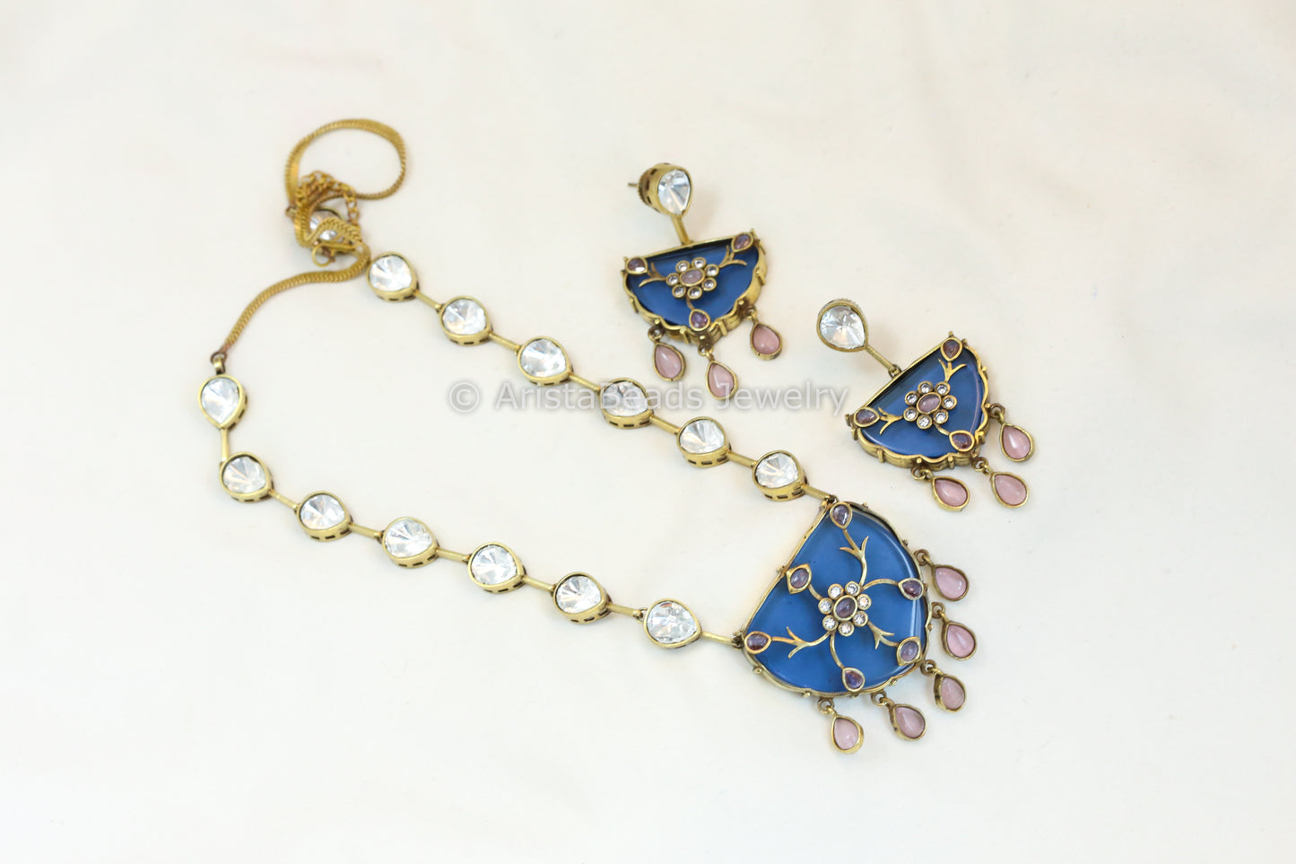 Antique Gold Uncut Polki Inlayed Kundan Necklace - Blue