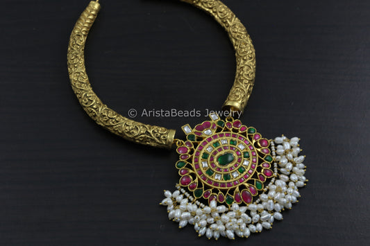 Jadau Kundan Pendant In Carved Hasli & Real Pearls